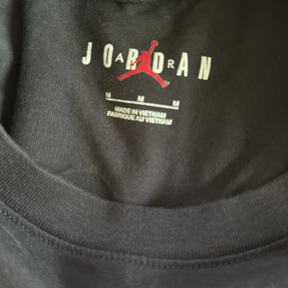 Jordan Black Long Sleeve Tee with Red Logo